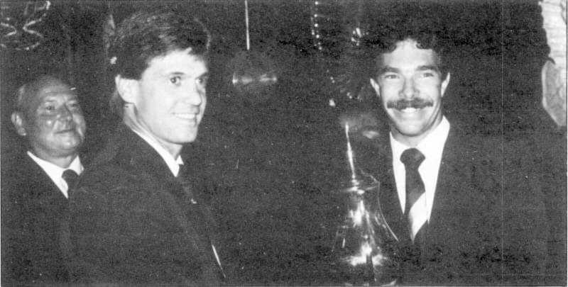 Winner receiving his trophy - click to enlarge Renier Moolman, Mike Basson and Charles Wotherspoon