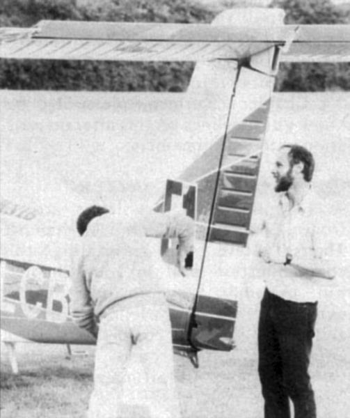 Competitors attach race numbers in preparation for day one. Competitors attach race numbers in preparation for day one.